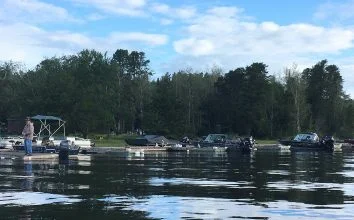 Fisherman Boats And Dock By Lake