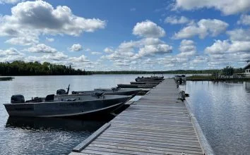 Fishing Boats Docked At Camp