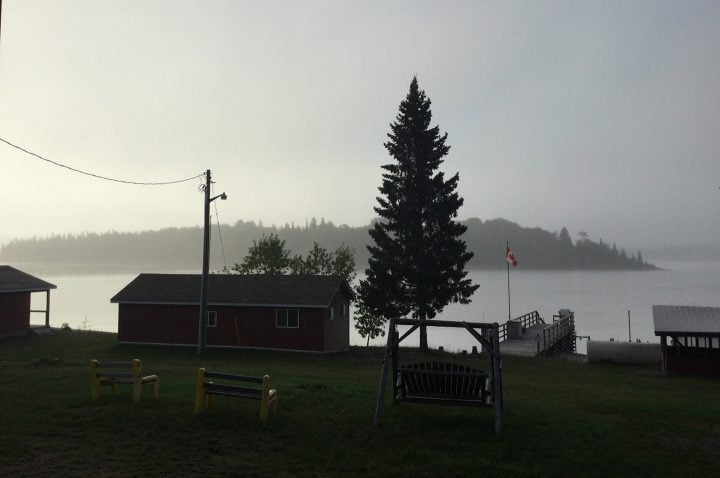 Morning Fog Hanging Over Camp And The Lake
